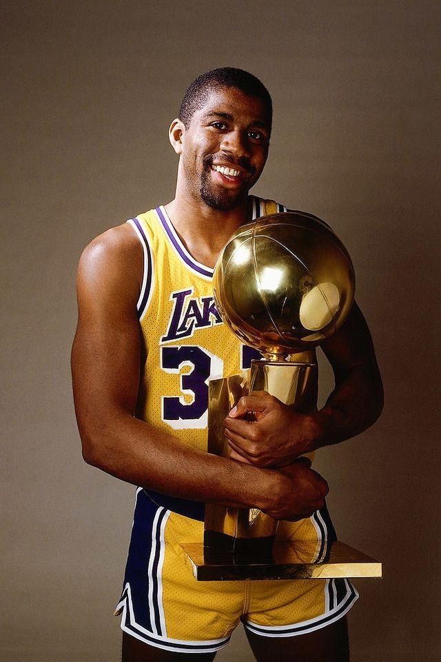 Magic Johnson with trophy